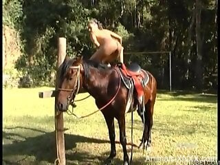 Tanned babe makes out on the horse in sexual fantasy