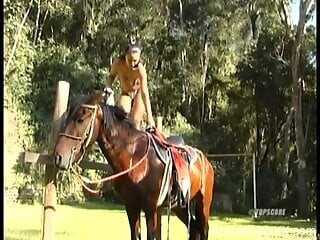 MILF with nice ass gets intimate next to her horse